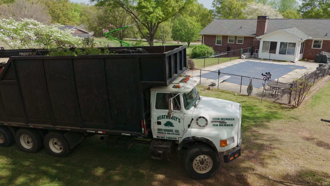 Heatherly chip truck at a residential property